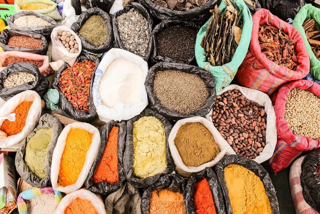 Bulk spices and botanical ingredients representing Nigerian and West African commercial supply